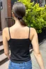 Archie Bow Tank sold by Brandy Melville