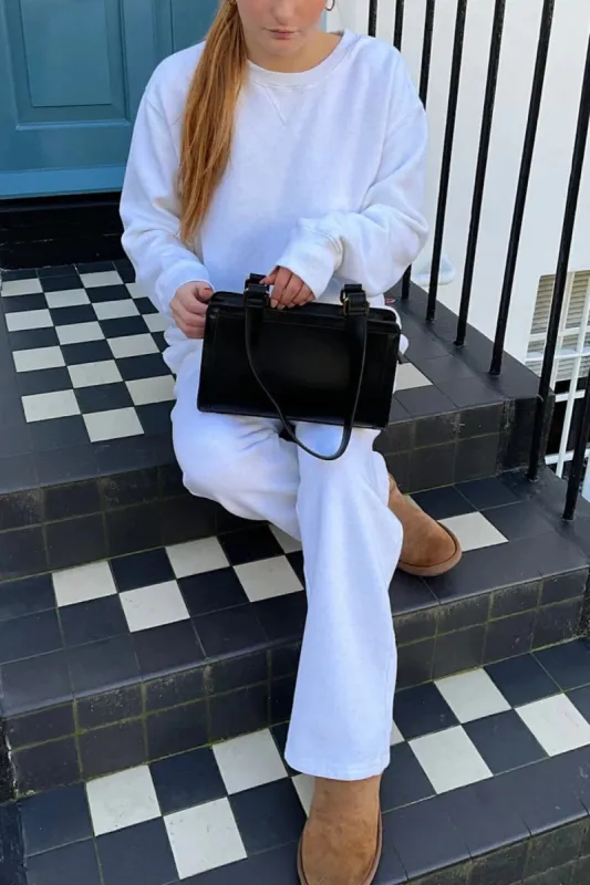 Black Purse sold by Brandy Melville