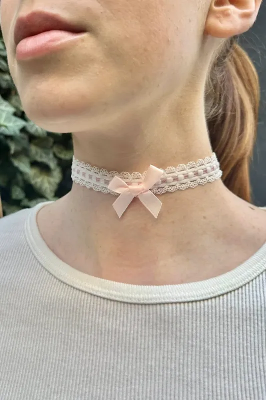 Lace and Bow Choker sold by Brandy Melville