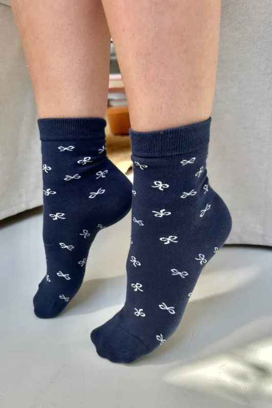 Bow Socks sold by Brandy Melville
