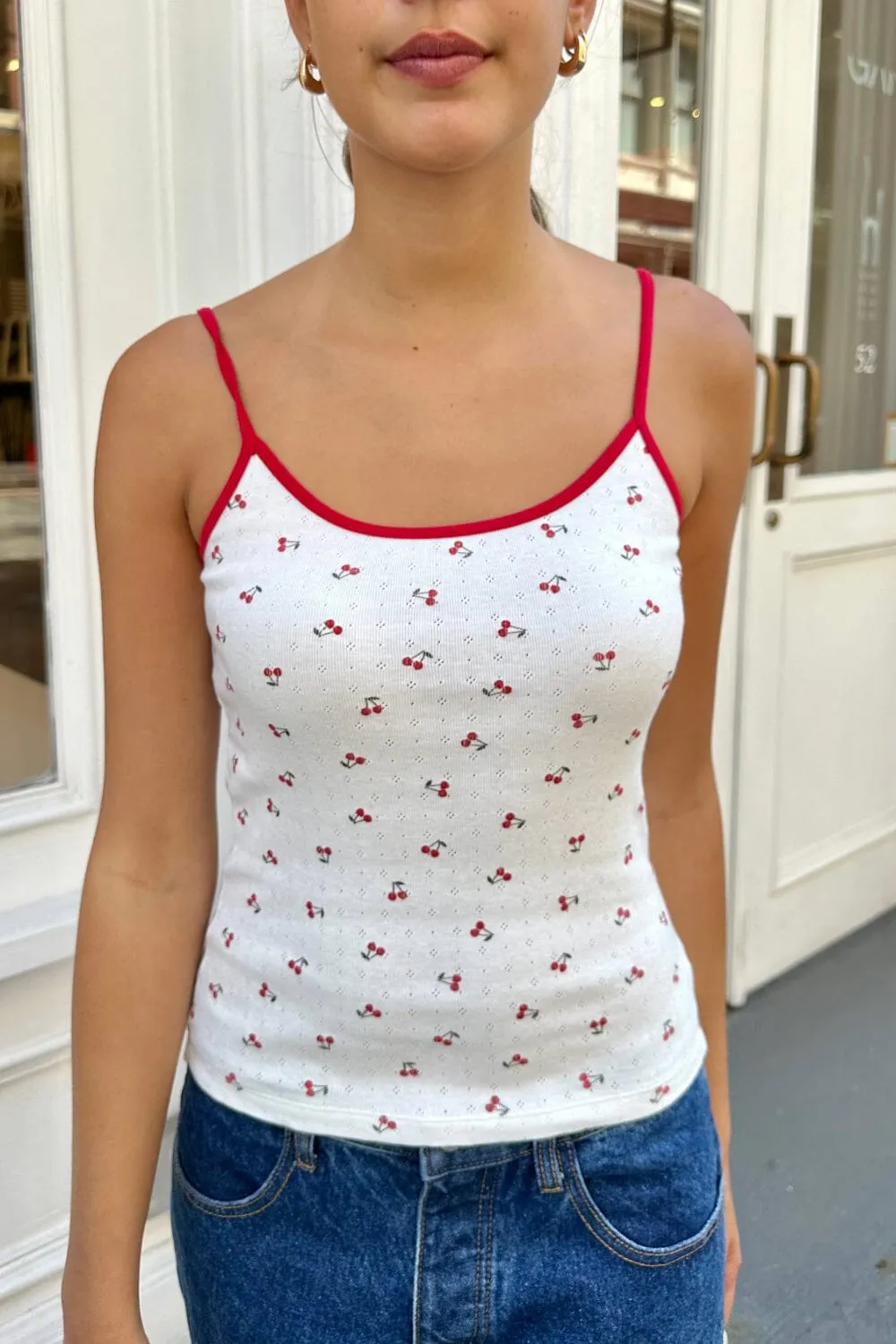 Skylar Pointelle Cherry Tank sold by Brandy Melville