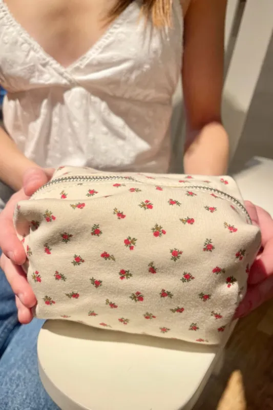 Red Roses Mini Makeup Bag sold by Brandy Melville