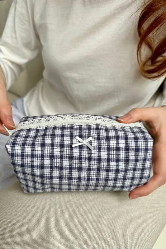 Plaid Makeup Bag sold by Brandy Melville