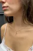 Cross Necklace sold by Brandy Melville