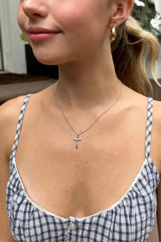 Cross Necklace sold by Brandy Melville