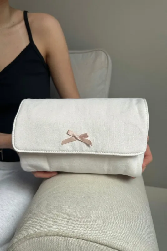 Bow Makeup Bag sold by Brandy Melville