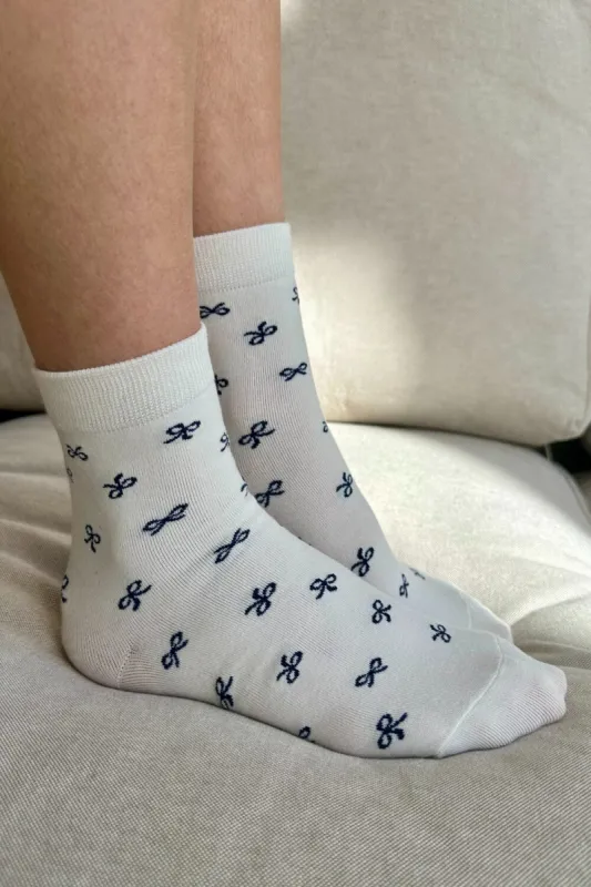 Bow Socks sold by Brandy Melville