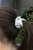 Floral Scrunchie sold by Brandy Melville