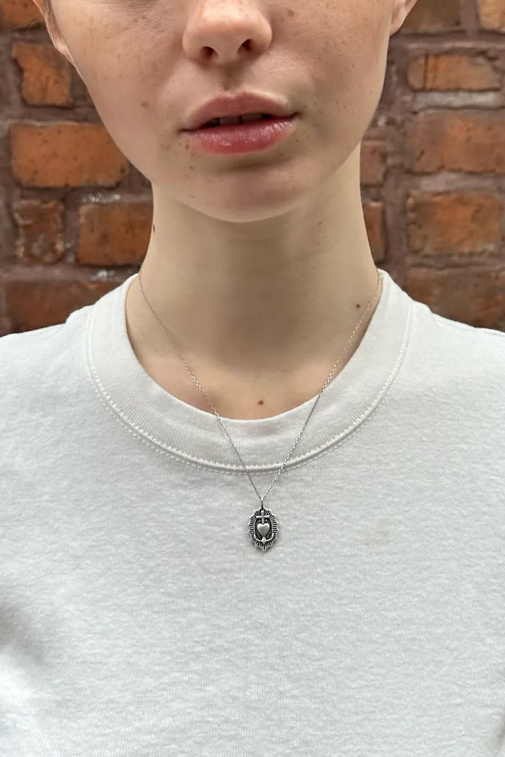 Heart with a Cross Necklace sold by Brandy Melville product image thumbnail 2