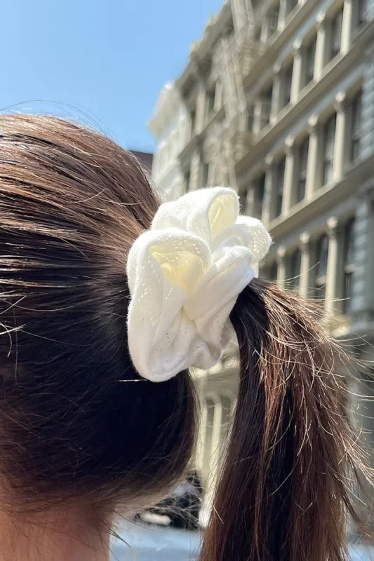 Heart Eyelet Scrunchie sold by Brandy Melville