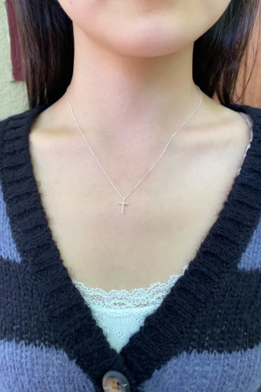 Cross Necklace sold by Brandy Melville
