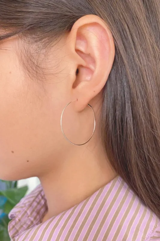 Thin Hoop Earrings sold by Brandy Melville