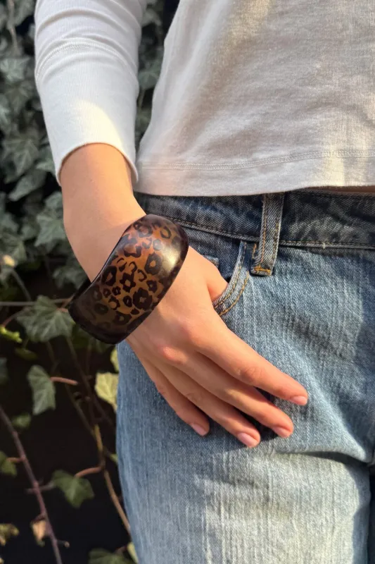 Leopard Rigid Bracelet sold by Brandy Melville
