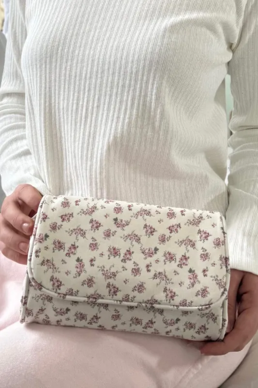 Roses Makeup Bag sold by Brandy Melville