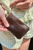 Coin Purse sold by Brandy Melville