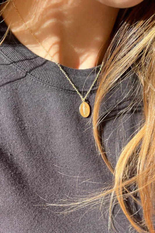Mother Mary Charm Necklace sold by Brandy Melville