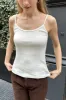 Skylar Eyelet Tank sold by Brandy Melville