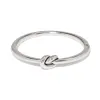 Interlok Single Knot Hinged Bangle sold by Brighton