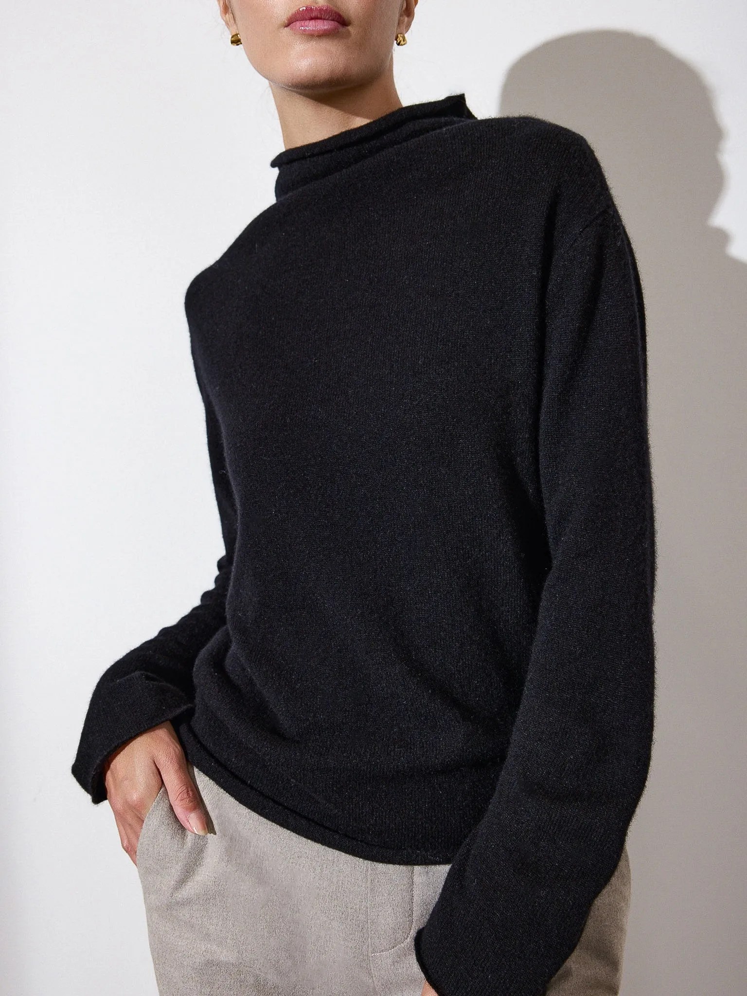 The Rhone Relaxed Funnel Cashmere Sweater sold by Brochu Walker