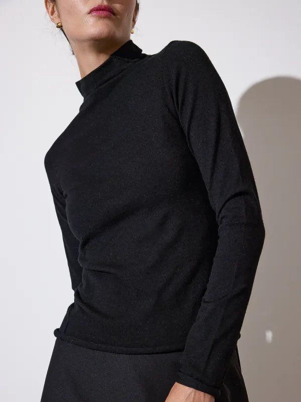 The Anika Mock Neck Top sold by Brochu Walker