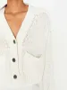 The Cropped Cardigan sold by Brochu Walker