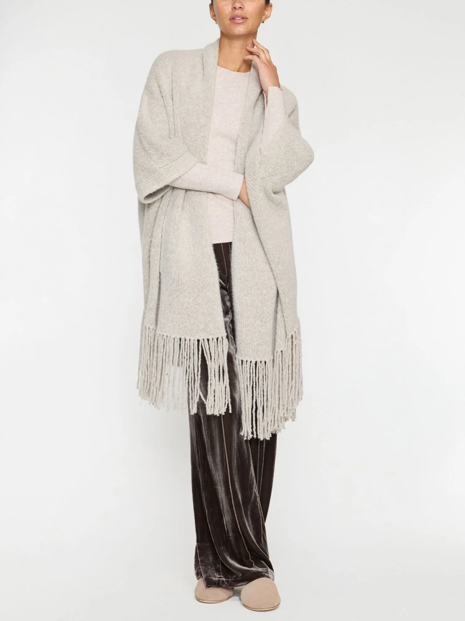 The Jens Poncho Wrap sold by Brochu Walker