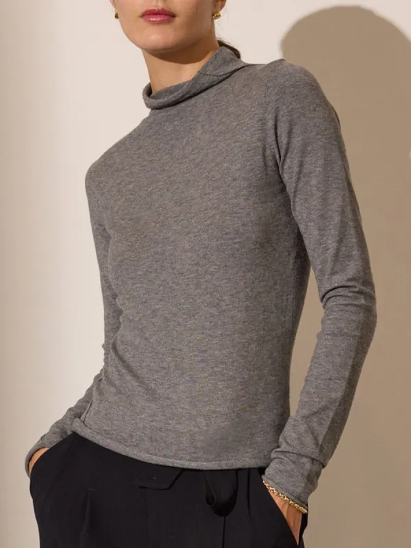 The Anika Mock Neck Top sold by Brochu Walker