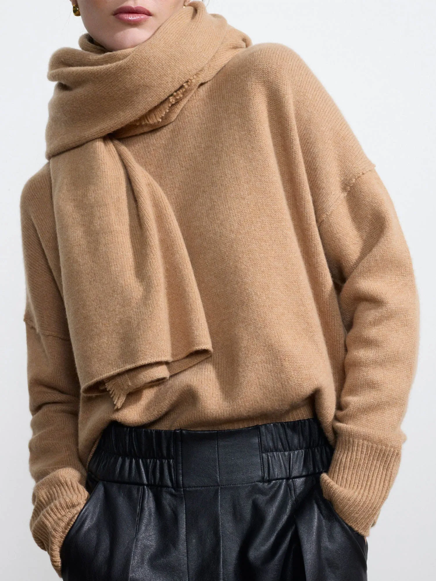 The Cashmere Fringe Wrap sold by Brochu Walker