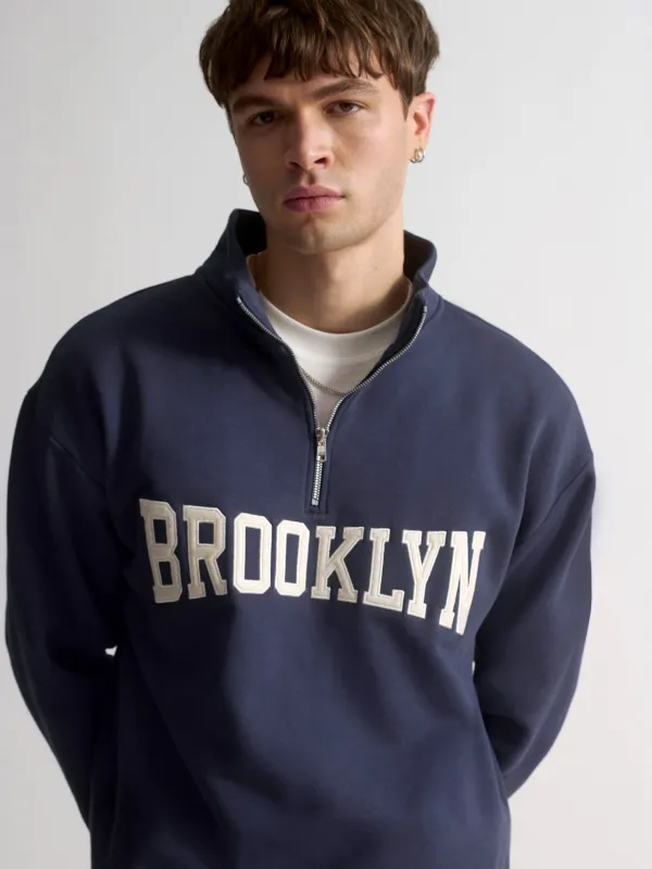 Men's Brooklyn Campus Half-Zip Sweatshirt In Mood Indigo made by Brooklyn Industries