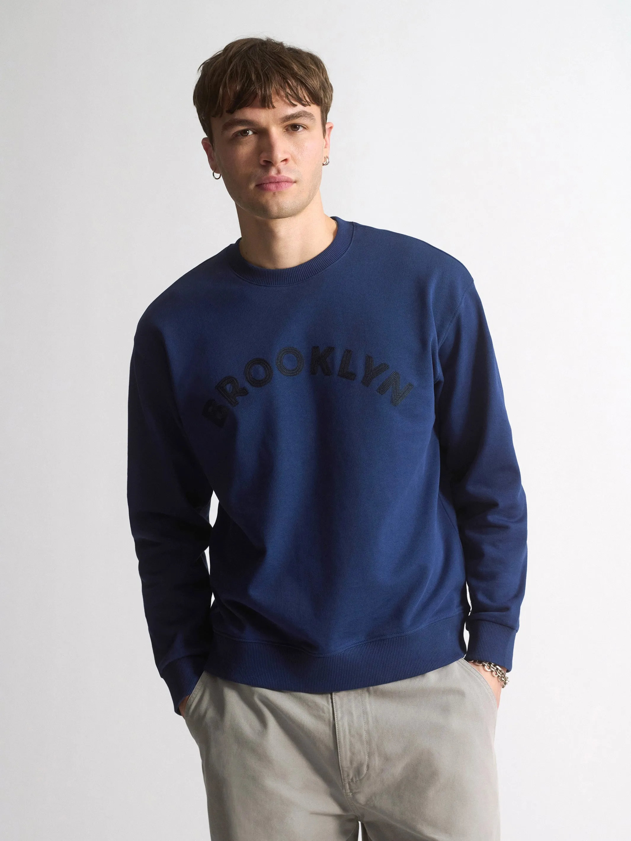Men's Brooklyn Logo Crew Neck Sweatshirt In Medieval Blue sold by Brooklyn Industries