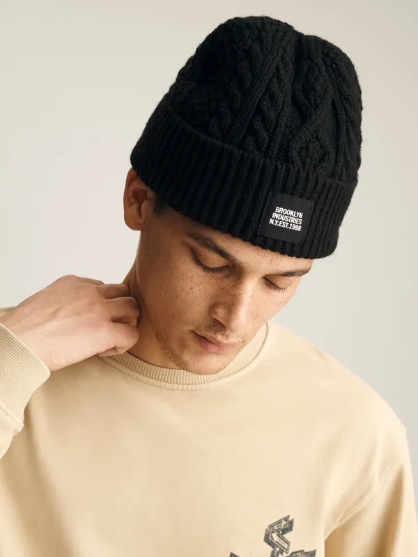 BKI Cable-Knit Beanie in Black sold by Brooklyn Industries