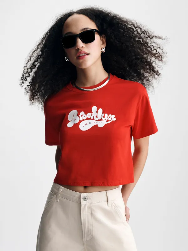Women's Cropped Brooklyn Industries T-Shirt in Goji Berry made by Brooklyn Industries
