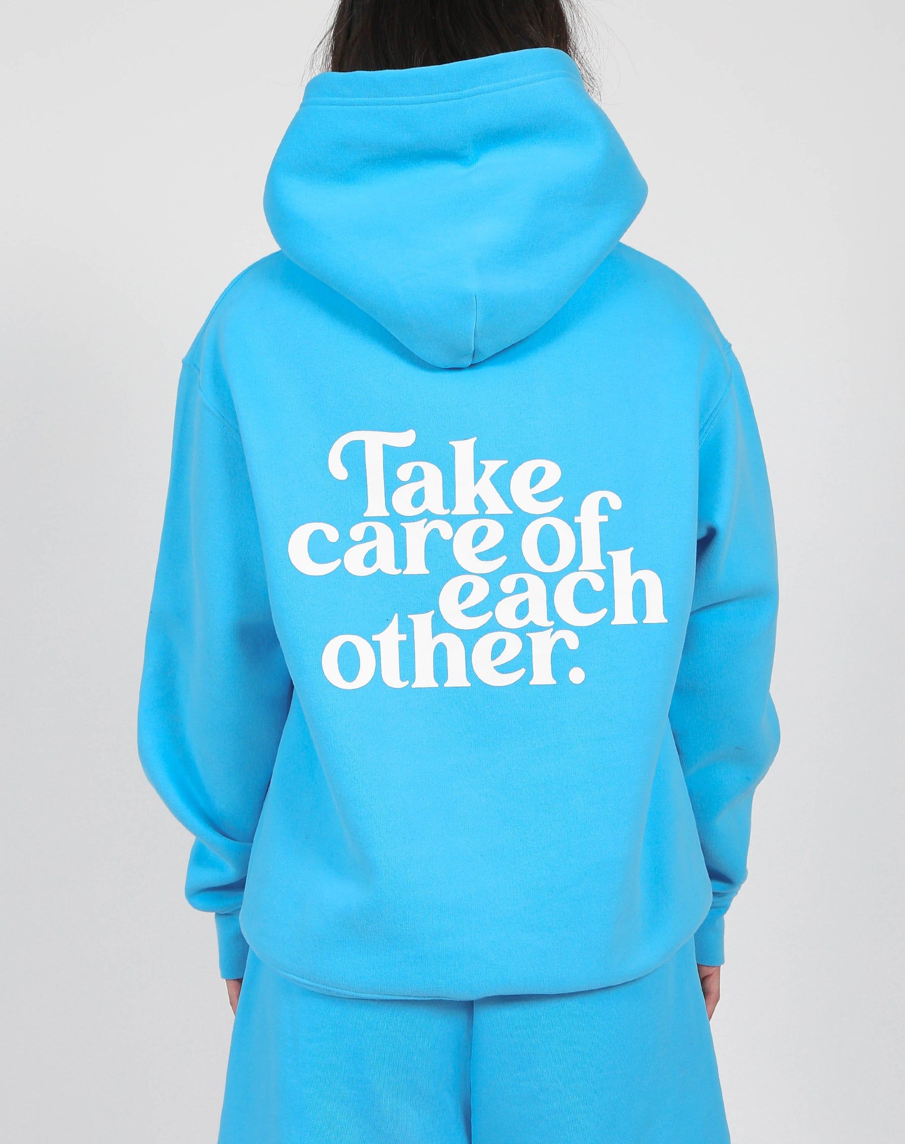 The "TAKE CARE OF EACH OTHER" Classic Hoodie | Mediterranean Blue sold by Brunette The Label
