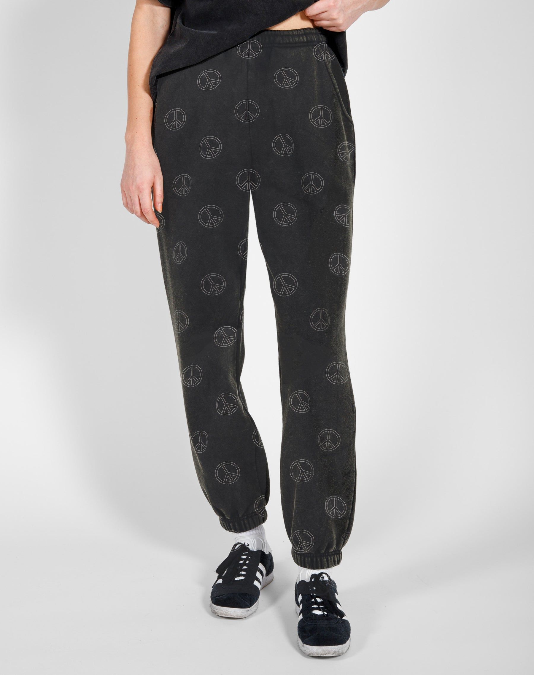 The 'ALL OVER PEACE SIGN' Oversized Joggers | Washed Black sold by Brunette The Label