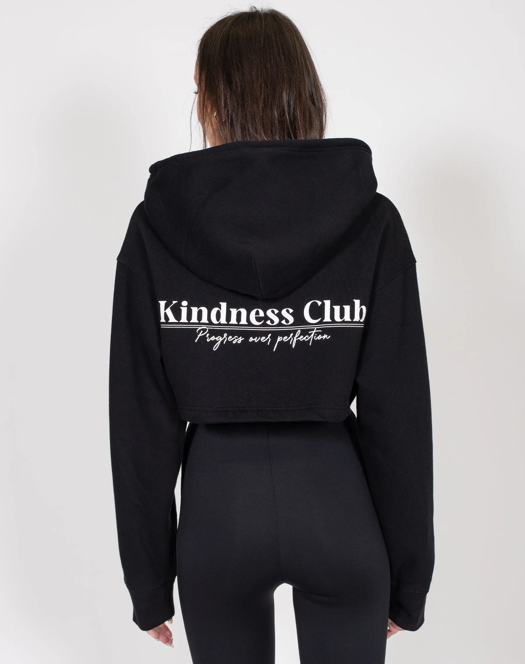 The "KINDNESS CLUB" Super Crop Hoodie | Black sold by Brunette The Label