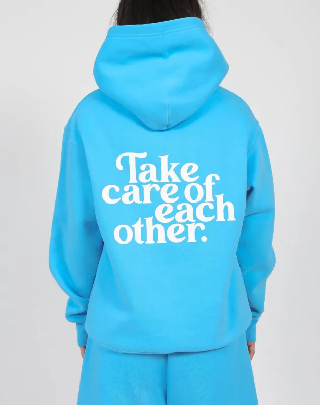 The "TAKE CARE OF EACH OTHER" Classic Hoodie | Mediterranean Blue sold by Brunette The Label