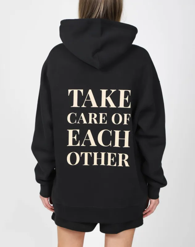 The "TAKE CARE OF EACH OTHER" Big Sister Hoodie | True Black sold by Brunette The Label