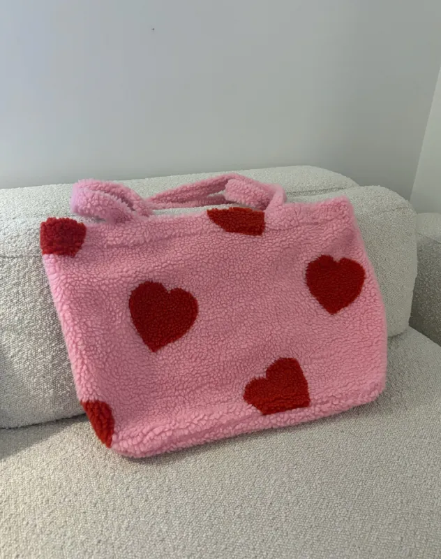 The "ALL OVER HEART" Sherpa Tote Bag | Baby Pink & Red sold by Brunette The Label