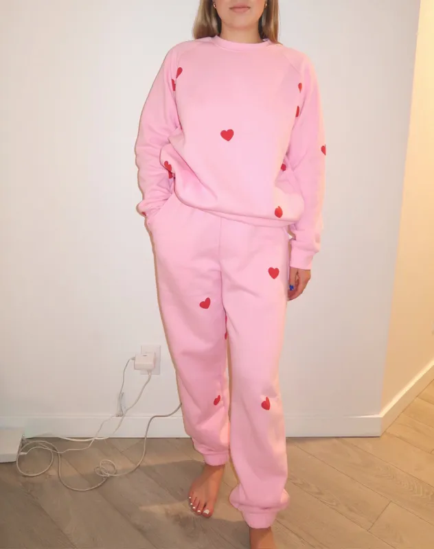 The "ALL OVER HEART" Oversized Joggers | Baby Pink & Red sold by Brunette The Label