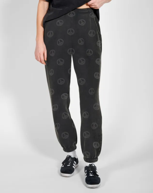 The 'ALL OVER PEACE SIGN' Oversized Joggers | Washed Black sold by Brunette The Label