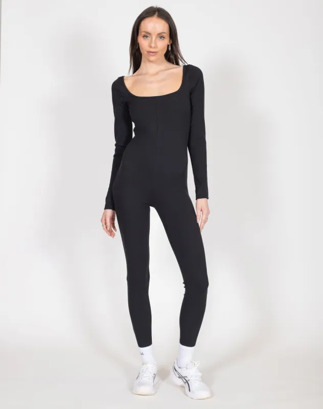 Ribbed Long Sleeve Jumpsuit | Black sold by Brunette The Label