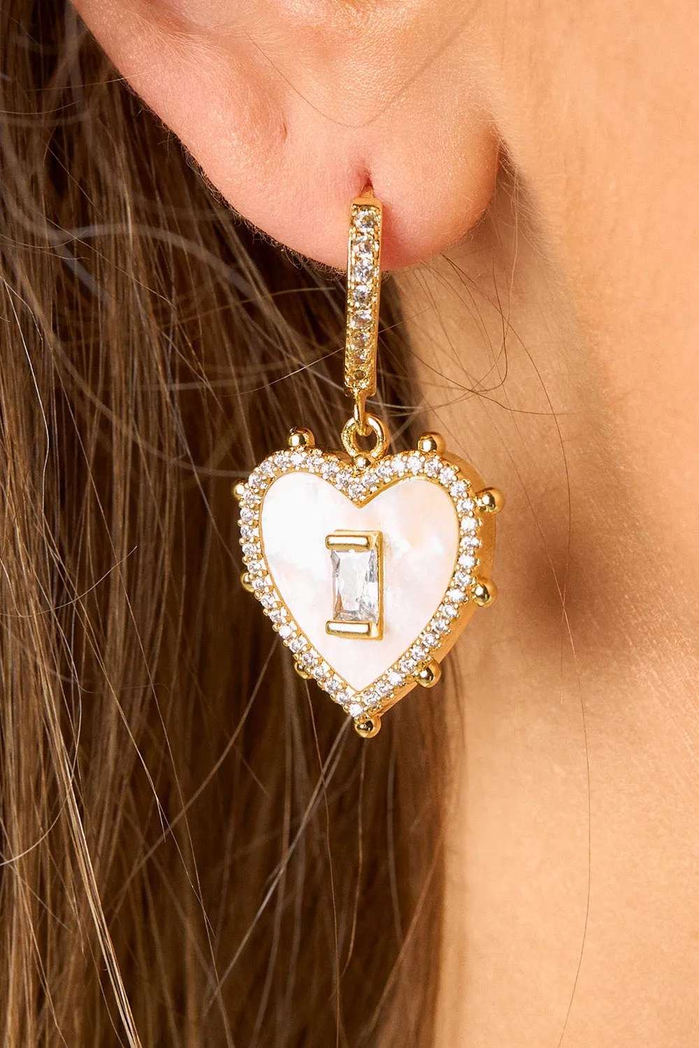 Pearl Huggie Earring - Clear sold by Buddy Love