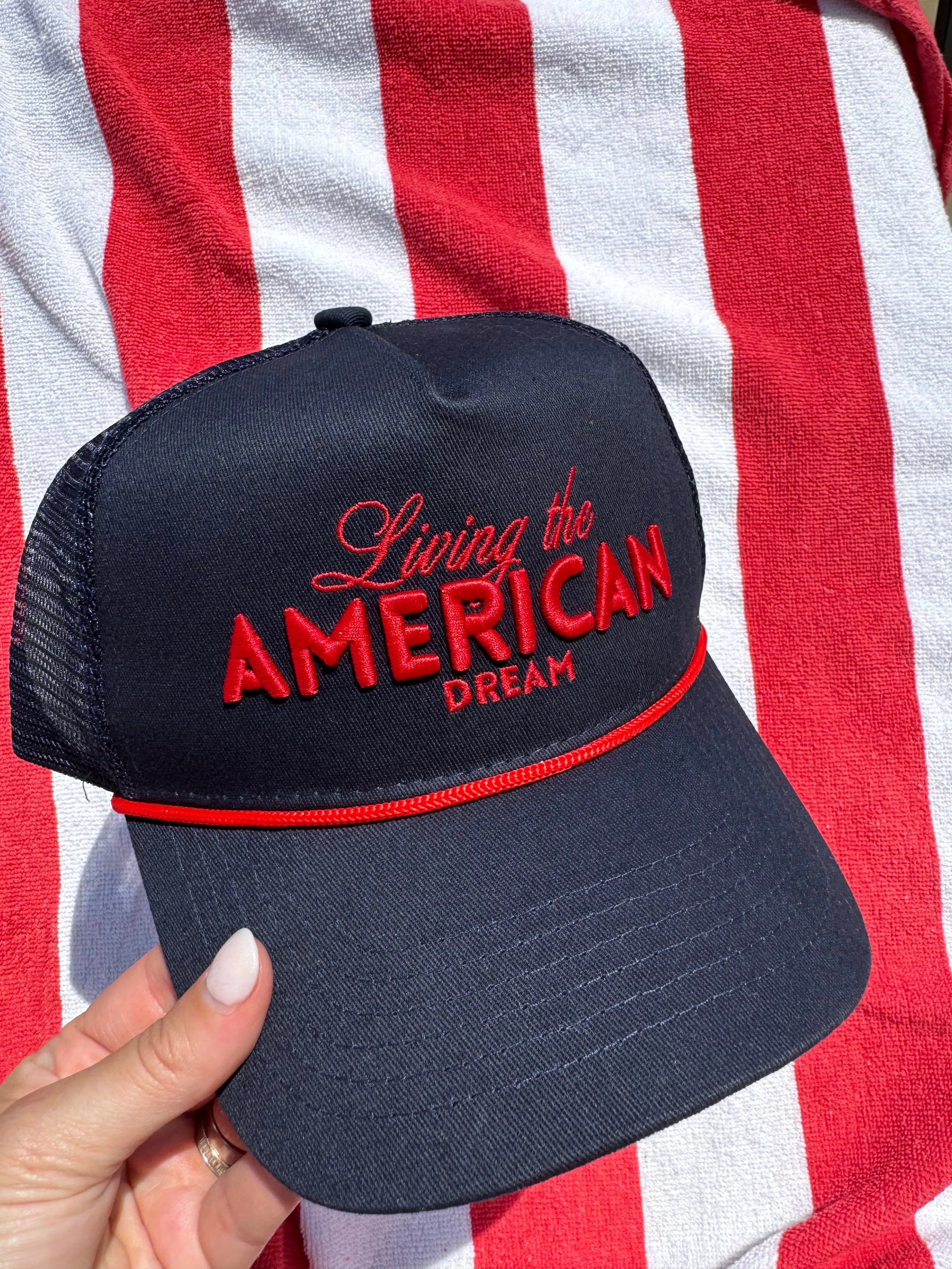 Living The American Dream - Navy Trucker Hat sold by Buddy Love
