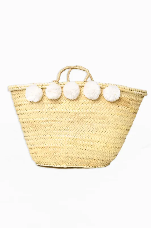 White Pom Straw Bag - White sold by Buddy Love