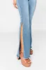 Judy Blue Full Size Mid Rise Raw Hem Slit Flare Jeans sold by Buddy Love