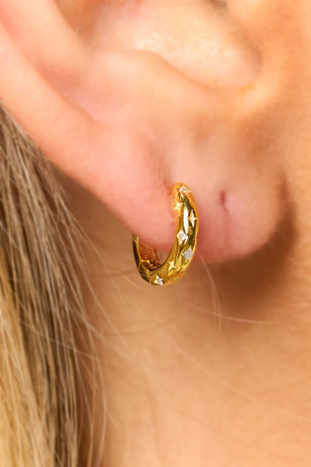 Star Huggie Earrings sold by Buddy Love