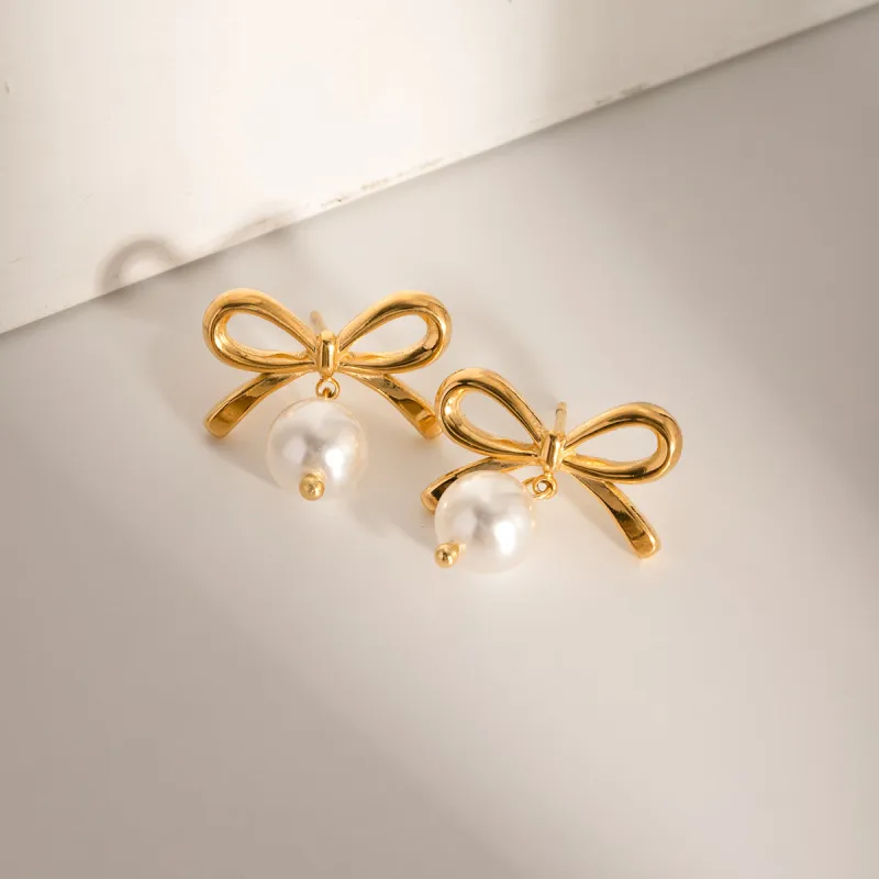 Stainless Steel Bow Pearl Earrings sold by Buddy Love