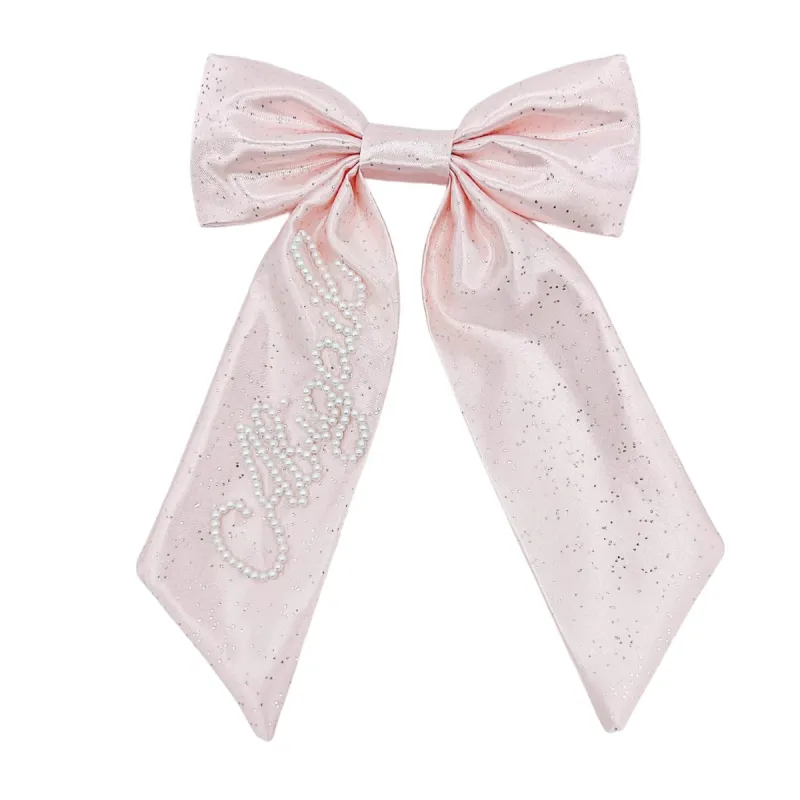 Pearl Pink Glitter Bow sold by Buddy Love