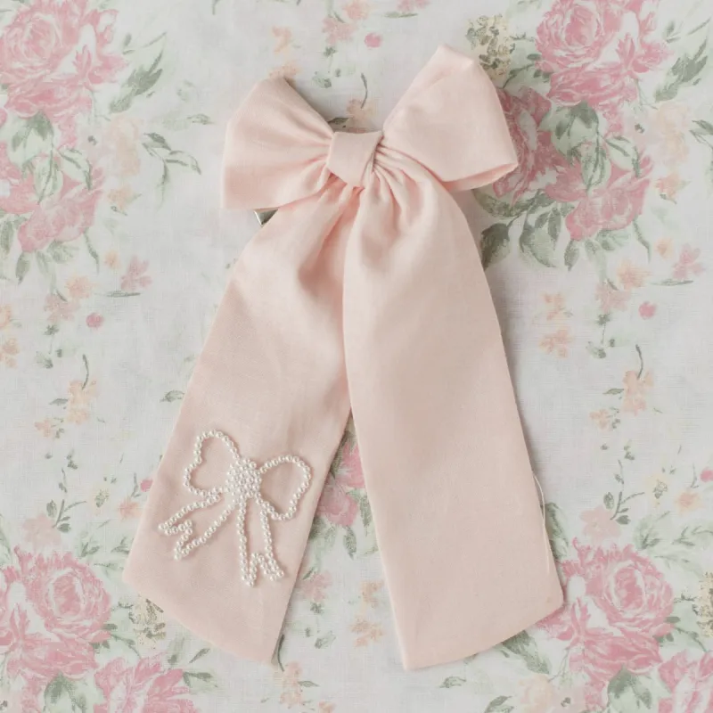 A Pearl Dream Pink Bow sold by Buddy Love