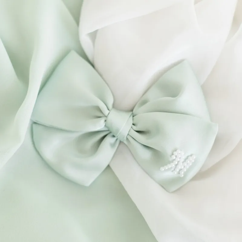 Pastel Green Pearl Initial Bow sold by Buddy Love